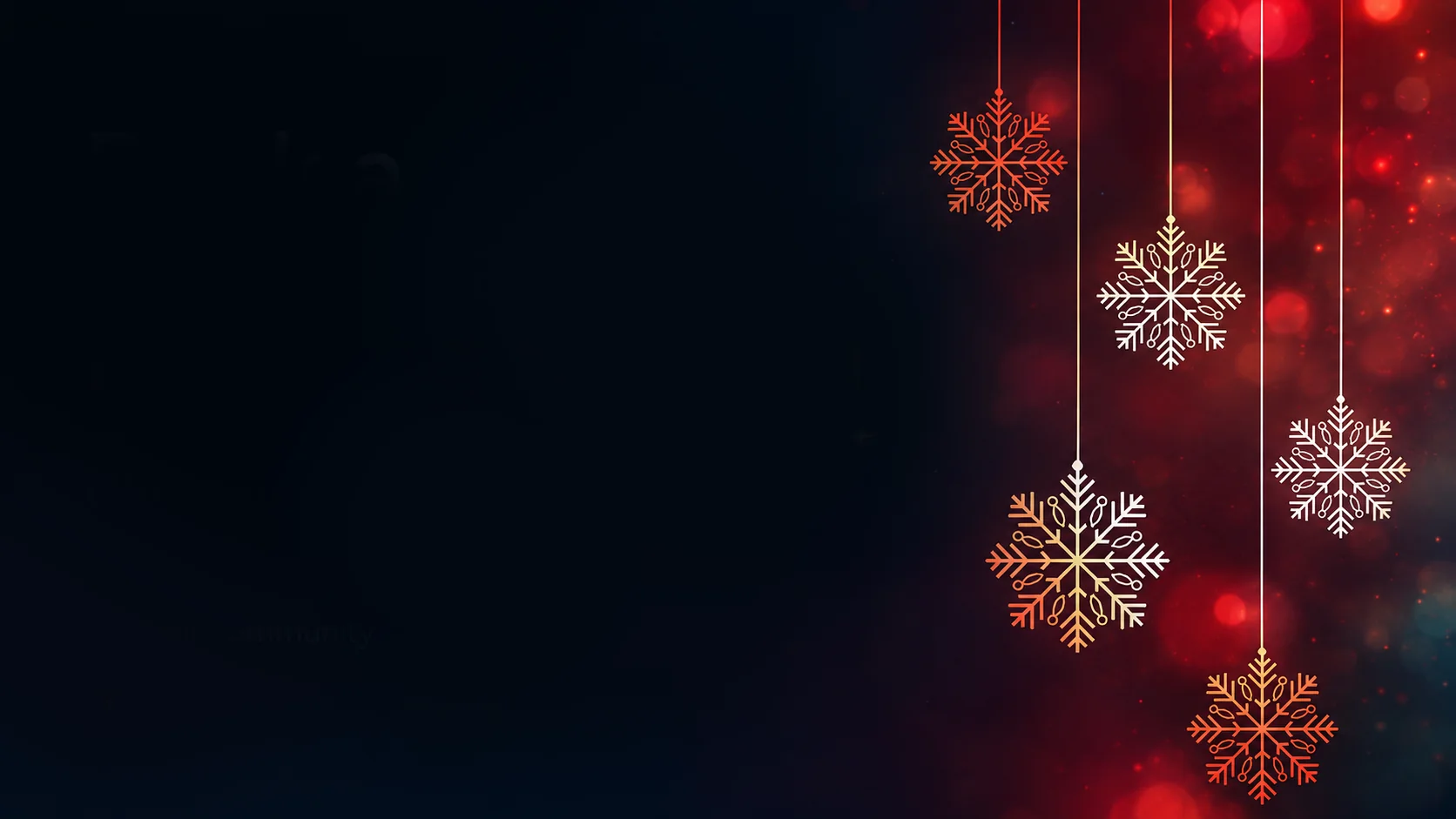 Snowflake ornaments hanging against a deep red and midnight-blue background