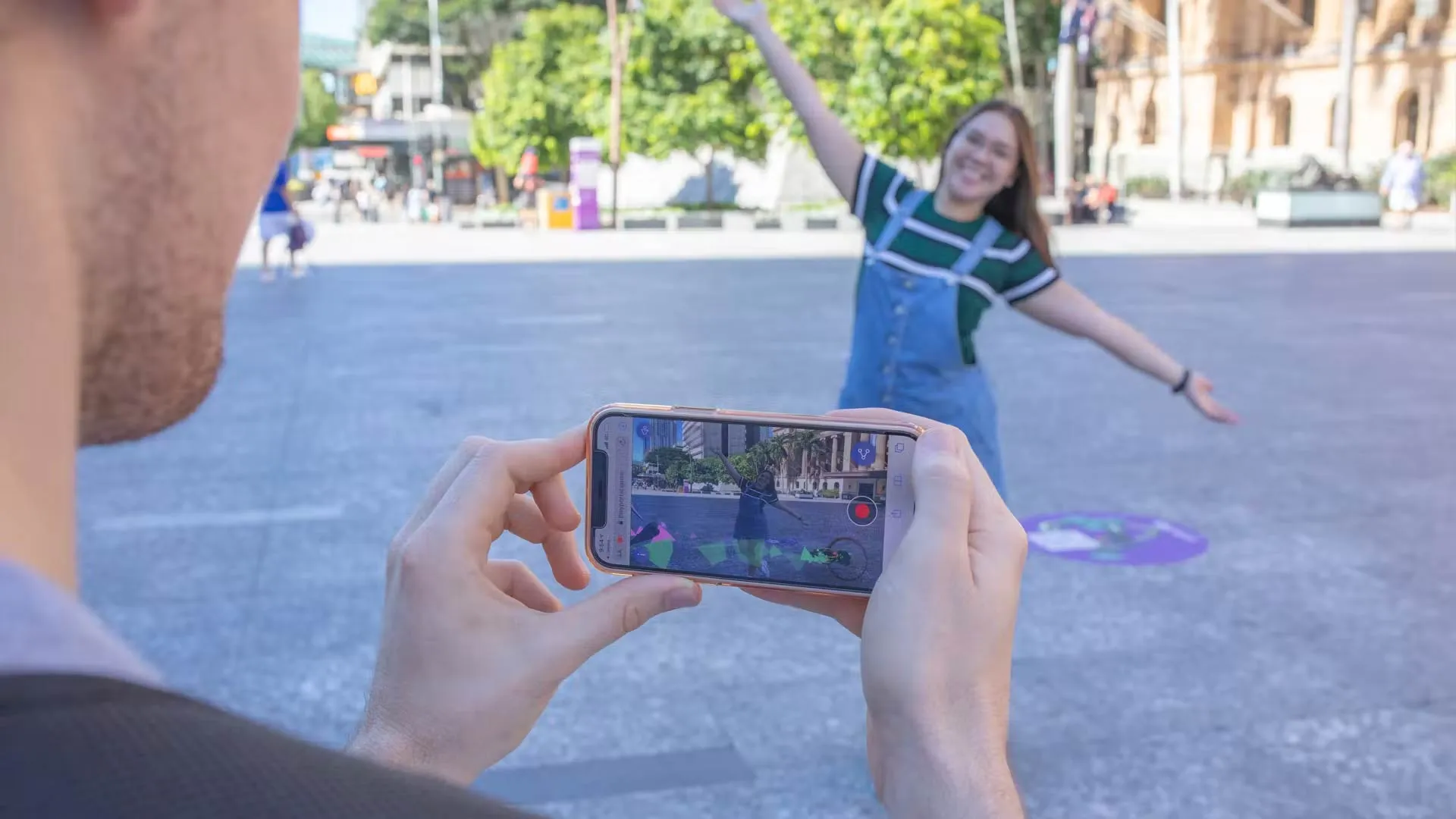 Artificial ecology AR being viewed through phone