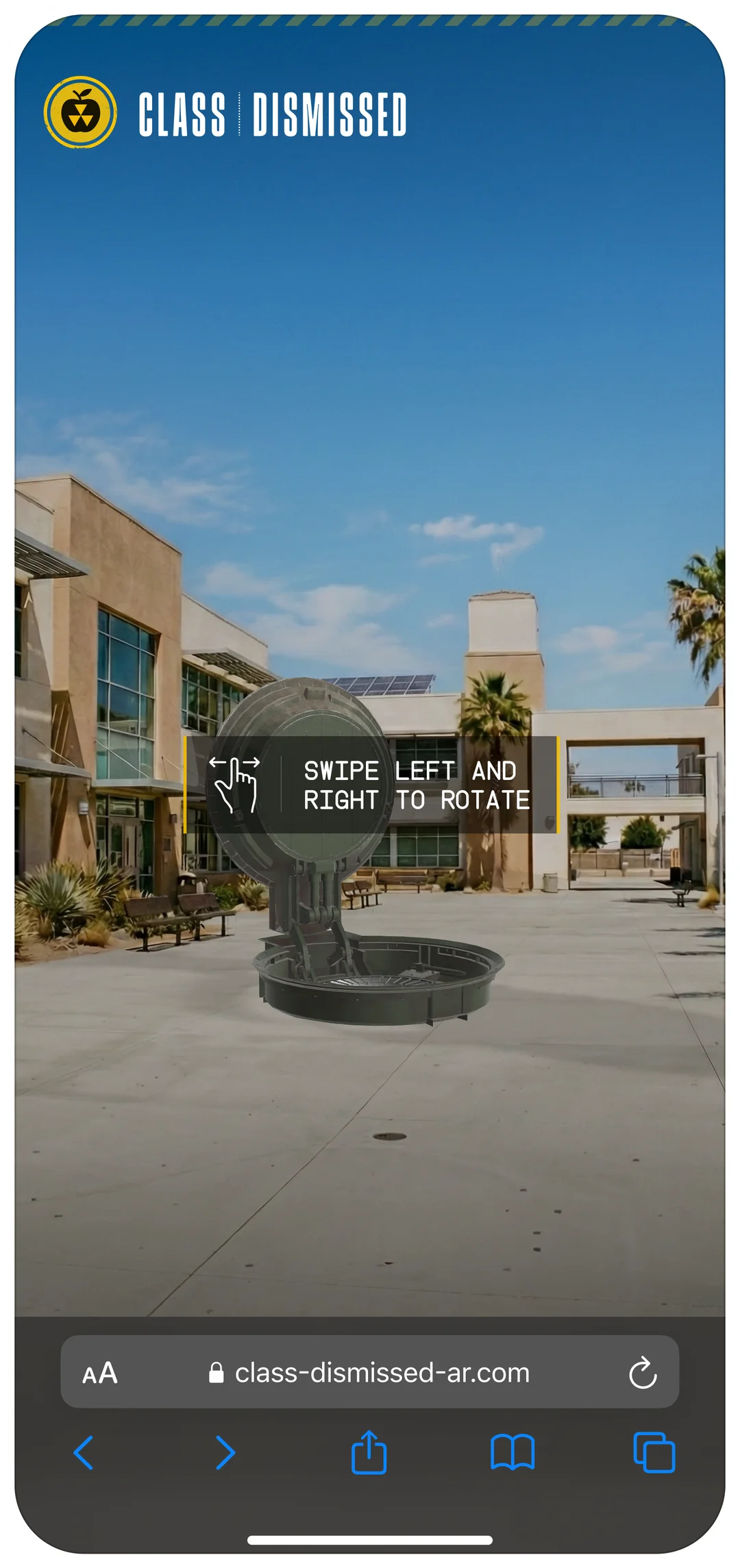 Class Dismissed - the open silo hatch placed in a school courtyard, with a hint to swipe left and right to rotate
