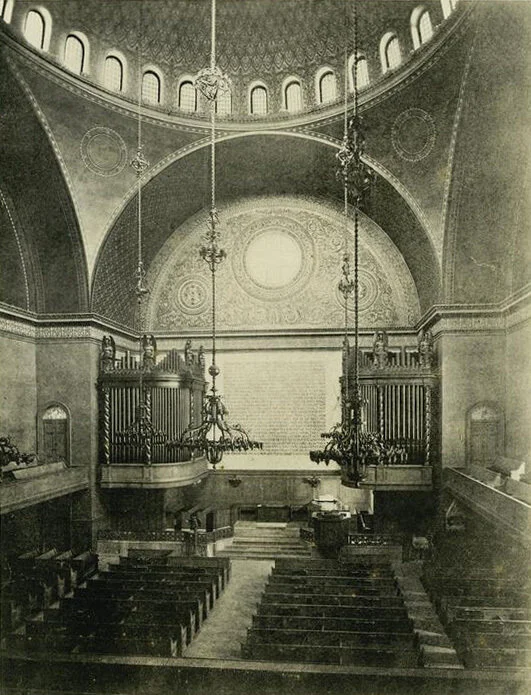 Interior of Plymouth Church, Brooklyn - a grand domed nave with twin pipe organs flanking the sanctuary